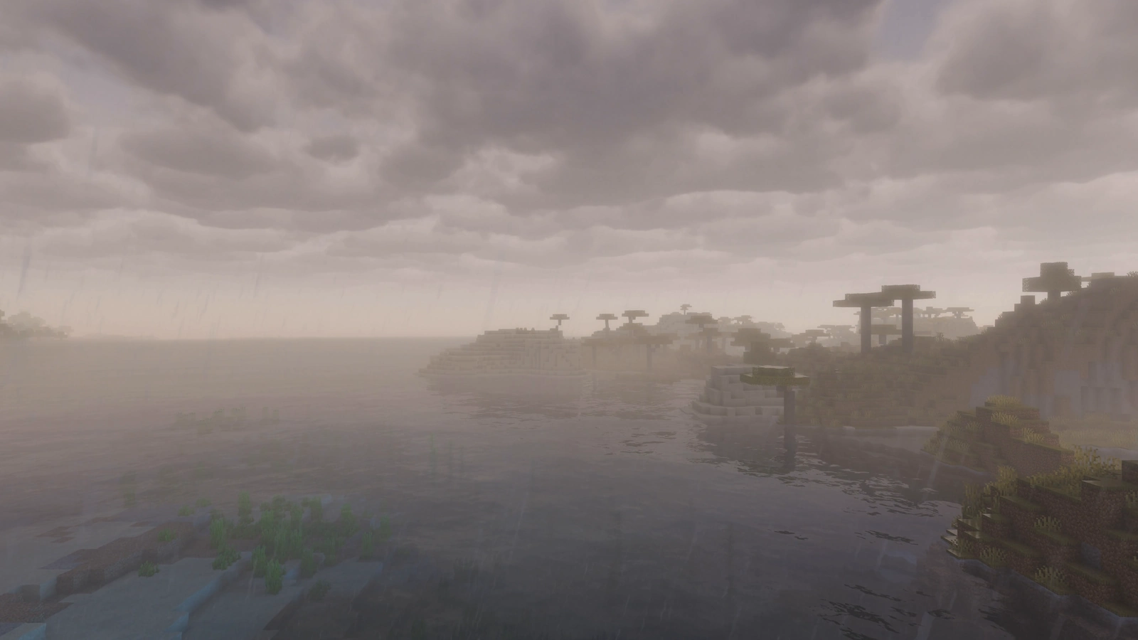 A fog-covered digital coastline recedes beneath a low grey sky.